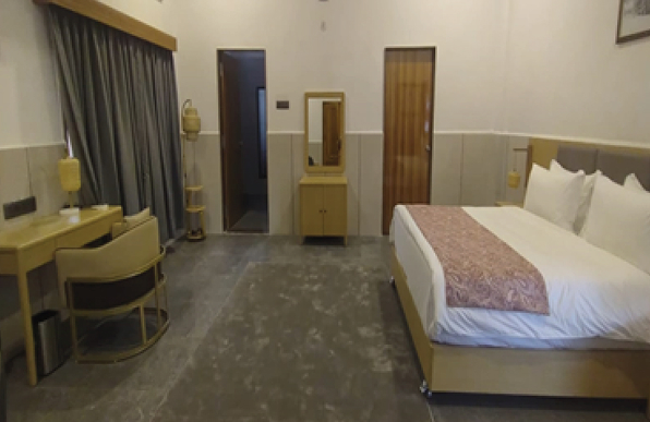 20*20 SqFt Bedroom Our serene 400 sq. ft. room offers a peaceful retreat for visitors. Designed with simplicity and comfort in mind